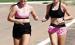 SCHS cross-country members Phebe Trout (left) and Hanna Winter on a timed run during Monday’s practice. (Record Photo)