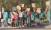 Peaceful protesters line the block at Patton Park along US83 Highway in Scott City showing their support for immigrants last Thursday evening. ( Record Photo)
