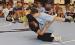 Jacob Frost throws his brother, Evan, to the mat while demonstrating a takedown during last week’s wrestling camp in Scott City. (Record Photo)