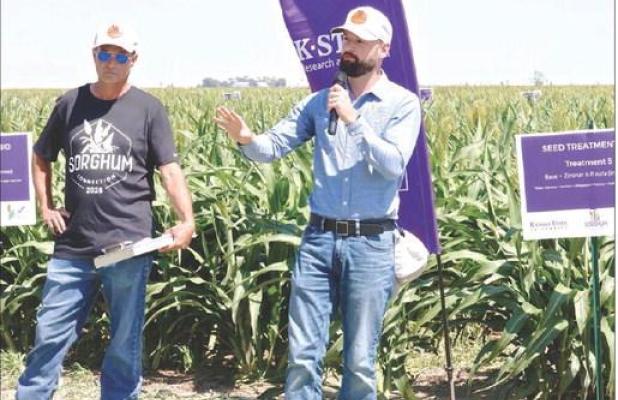 Adam York (right), CEO of Kansas Sorghum, and Andy Hineman, a Lane County producer and president of the Kansas Grain Sorghum Commission, address those attending the recent Sorghum Connections field day in Lane County. (Record Photo)