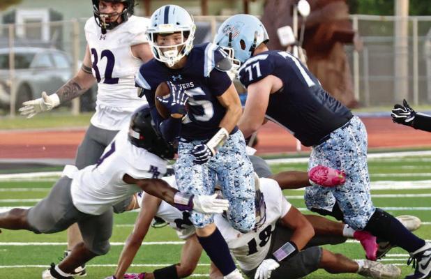 SCHS sophomore runningback Jayden Weston slips away on a 32 yard screen pass that sets up Scott City’s first touchdown against Mesa Ridge. (Record Photo)