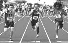 (Above left) Dighton sophomore Joey Hudson (No. 1050) competes in the 800m at the state track meet. (Above right) Connor Wilson takes the baton from Westin Johnson in the 4x100m prelims on Friday. (Left) Sophomore Jace Jenkinson (center) in the finals of 