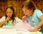 rs Kinzie Fisher (left) and Audrey Bryant participate in a recent STEM workshop in which they were studying bubble structure and how bubbles share walls, preferring to honeycomb together. (Record Photo) If you’re looking for a way to beat summer boredom, 4-H is the answer