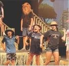 The Central Park zookeepers perform a song during rehearsal for “Madagascar: A Musical Adventure for Kids.” Zookeepers are (from left) Noah Keith, Lynnlee Cline and Layla Belcher. Performances are Sunday and Monday at the high school. (Record Photo)