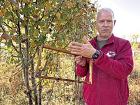 Robert Burns has been beekeeping for decades and manages about 100 colonies. He is used to caring for the insects and knows when to feed each colony with sugar syrup to make up for a dry season and lack of nectar. He said he also regularly treats the hone