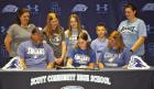 SCHS senior Cally Cramer accepts a scholarship for band and choir at Colby Community College, joined by her parents, Mark and Cindy Cramer. Looking on in the back row are (from left) CCC band director Michelle Meyer, Baily, Marly and Landon Cramer and SCH CCC awards Cramer band, vocal scholarships