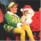 Santa (Scott Wagner) tells Buddy (Reed Batterton) the story of his life and how he arrived at the North Pole during the SCHS musical production of “Elf.” (Record Photo)