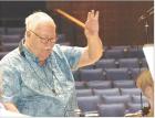 Longtime director of the Flatland Big Band, Clint Raynes, during last Saturday’s rehearsal sessions in preparation for that evening’s performance. (Record Photo)