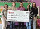 Wheatland Electric Cooperative representative Samantha Garcia (right), presents a $1,000 WEC Sharing Success grant to Golden Rule Preschool board secretary Denise Dreiling (far left) and teachers Emily Bergman, Belinda Fernandez and Tatum Wells.