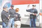 Ed Van Buren, founder of Code 2 K-9 Training, explains techniques and procedures to law enforcement officers when conducting a search of commercial motor vehicles during a three-day seminar in Scott City. (Record Photo)