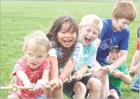 Youngsters at Scott City Elementary School took part in their end-of-the-year play day at the Scott Recreation Commission soccer fields on Monday with a wide range of individual and team activities. Digging in their heels during the tug-of-war are first g flexing their muscles