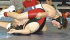 SCMS seventh grader Hudson Eisenhour pins Slayden Schroeder (Great Bend) during a five-team scramble held on the home mats last Thursday. (Record Photo)