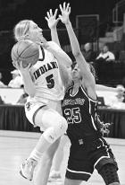 WCHS senior Megan Ricke is guarded by Valley Heights’ Ava Smith as she attempts a shot during second half action in the Class 2A state tournament opener on Wednesday. (Record Photo) Top-seeded Indians ousted in state opener