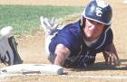 SCHS senior Blaine Culp dives safely to first base during Tuesday’s league action at Holcomb. (Record Photo) Scott City boys salvage split against Longhorns