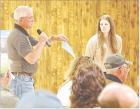 Clint Pearson, Scott City, asks a question of the NextTera representatives during Tuesday’s presentation of the wind, solar and battery storage projects that are planned for Scott and Lane counties. (Record Photo)