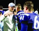 Head coach Jim Turner gets ready to share a hug with senior Griffin Edwards after Scott City’s season-ending loss in the Class 4A sectional playoff game. (Record Photo)