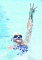 Kaitley Edwards competes in the 50 yard backstroke during the Scott City Stars swim meet last Saturday. (Record Photo) Stars are champs in opening meet