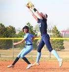 Scott City first baseman Piper Fox grabs a high line drive during last Friday’s softball Jamboree against Cimarron. (Record Photo)