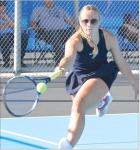 Scott City senior Malorie Cupp chases down a shot for a return during Monday’s home invitational action. She finished third in No. 1 singles. (Record Photo) SC number ones come up short
