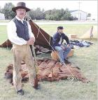 Historical re-enactors Steve Krehbiel (foreground) and his son, Troy, during a recent presentation at the El Quartelejo Museum in Scott City. (Record Photo)