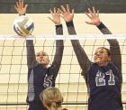SCHS senior Kinleigh Wren (left) and junior Lily Lightener combine for a block during last Thursday’s triangular action against Wichita County. (Record Photo)