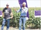 Adam York (right), CEO of Kansas Sorghum, and Andy Hineman, a Lane County producer and president of the Kansas Grain Sorghum Commission, address those attending the recent Sorghum Connections field day in Lane County. (Record Photo)