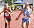 Scott City sophomore Lily Lightner leans into the finish line in the prelims of the 4x100m relay during the state track and field championship last Friday. (Record Photo)