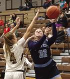 Scott City’s Kaylee Felker puts up a shot during Saturday’s tournament action against Garden City. (Record Photo)