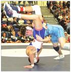 Scott City senior Brandon Roberts takes Russell’s Stephan Baldwin off his feet for a second period takedown in the 120-pound championship finals during the Scott City Classic on Saturday. (Record Photo) Article Image Alt Text