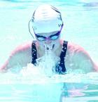 Maddie Goode competes in the 50m breaststroke. (Record Photo) Stars close regular season with Leoti title; swimmers claim 25 individual wins