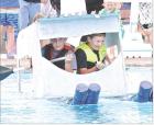 Scott City Middle School fourth graders demonstrated their creativity and seamanship during the annual cardboard boat regatta held last Wednesday at the Scott City swimming pool. Navigating “The Jenny” were Bowen Kerr (left) and Maddox Brown. Nearly e