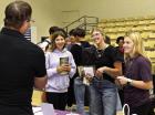 Visiting with a representative from Southwestern College during College Day on Monday were SCHS seniors McCall Miller, Addison Noll and Marly Cramer. (Record Photo)