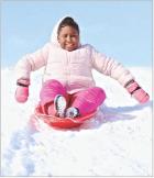 With an unexpected day off from school, nine-year-old Zariya Sudds, Scott City, took advantage of a snow storm to enjoy sledding at Maddux Park on Wednesday morning. Scott City received about five inches of snow. (Record Photo)