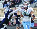 Scott City’s Avry Noll hauls in a pass that was good for a 34 yard gain and set up the Beavers second touchdown against Hays-TMP last Friday. (Record Photo) Article Image Alt Text