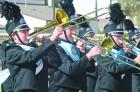 Members of the SCHS trombone section performing during the High Plains Marching Festival in Hays on Monday were (from left) Kaleb Beaton, John Browning and Jakub Harris. (Record Photo) Article Image Alt Text