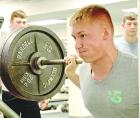Scott City senior Pierce Vallejo completes a lift on the squat rack during a morning workout. (Record Photo)