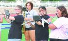 SCHS marching band members (from left) Betty Selfridge, Shannon Stromberg, Isadora Labra and Jordan Rufenacht practice one of their songs during band camp. (Record Photo)