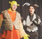Donkey (Max Contreras) is trying to convince Shrek (Landon Trout) to sing a song to enjoy the trip to rescue Princess Fiona. (Record Photo) ‘Shrek’ brings talent, message to the SCHS stage for 2 performances