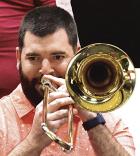 Jacob Miller plays a trombone solo during the morning rehearsal. (Record Photo)