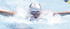 Sophia Goode competes in the 100m butterfly. (Record Photo) Goode, Trout strike gold