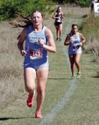 SCHS sophomore Lenzy Golemboski, followed by teammate Maryali Armendariz, compete at the Ness City meet. (Record Photo)