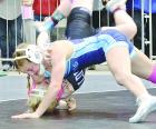 SCHS junior Haylie McDaniel throws Haylee King (Baldwin) to her back for near-fall points on her way to a technical fall during the Class 4A state wrestling championships. McDaniel was a silver medalist in the 110-pound division. (Record Photo)