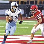 Scott City’s Martin Purma gets to the edge for a five yard gain during Monday’s game at Dodge City. (Record Photo)