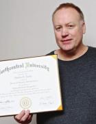 Turley completes long, winding road to a doctorate