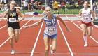 Scott City senior Heather Wren allows herself a smile as she leans for the finish line to earn a silver medal in the 400m in the Class 3A state finals on Saturday. (Record Photo)