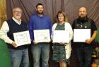 Adults who were honored for their contributions to the county 4-H program were (from left) Mayor Everett Green, representing Scott City, Extension Appreciation Award; Clint Dearden, Alumni Award; Kay Harkness, Friend of 4-H; and Eric Vasquez, 4-H Voluntee 4-H achievements