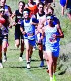 SCHS freshmen Asher Winter (653) and Diego Ortiz (651) in a pack of runners at the Ness City Invitational on Saturday. (Record Photo)