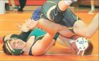 SCHS 145-pounder Justus McDaniel gets a fall against Pratt’s Zach Lamatsch during Saturday’s action in the Abilene Invitational. (Record Photo)