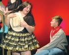 In the Bar-B-Bar Saloon, Chelsie Rose sings to saloon patron Kade Bonville in a scene from the musical “Curtains.” (Record Photo) ‘Curtains’ brings old musical nostalgia with a hint of mystery and lots of humor