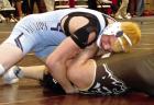 Scott City’s Blaze Gossman collects near-fall points in a 16-0 technical fall win over Garden City’s James Hill during the Rocky Welton Invitational on Saturday. (Record Photo)